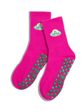 Pink grip socks with green slip-resistant aliens on a white background. Slip-resistant socks for pilates, barre, lagree or yoga.